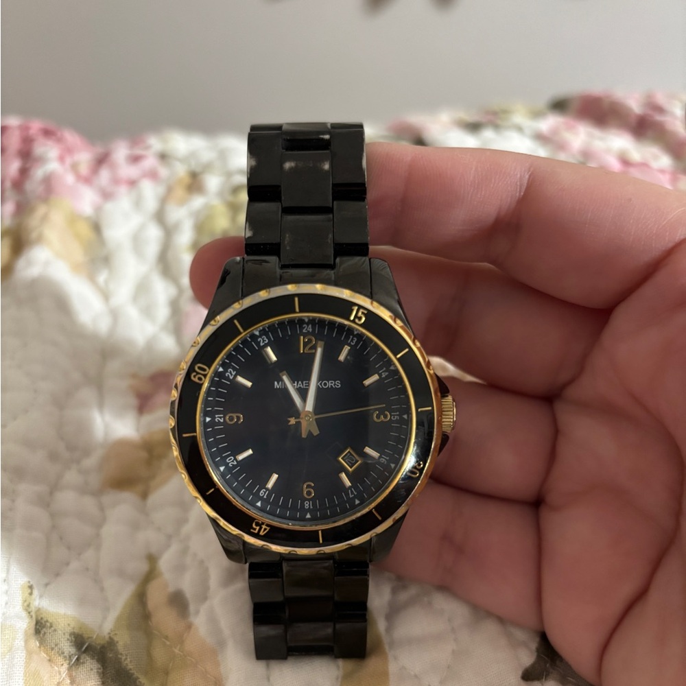 Michael Kors Black and Gold Timepiece